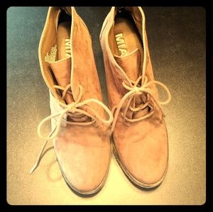 Brown lace up heeled boots